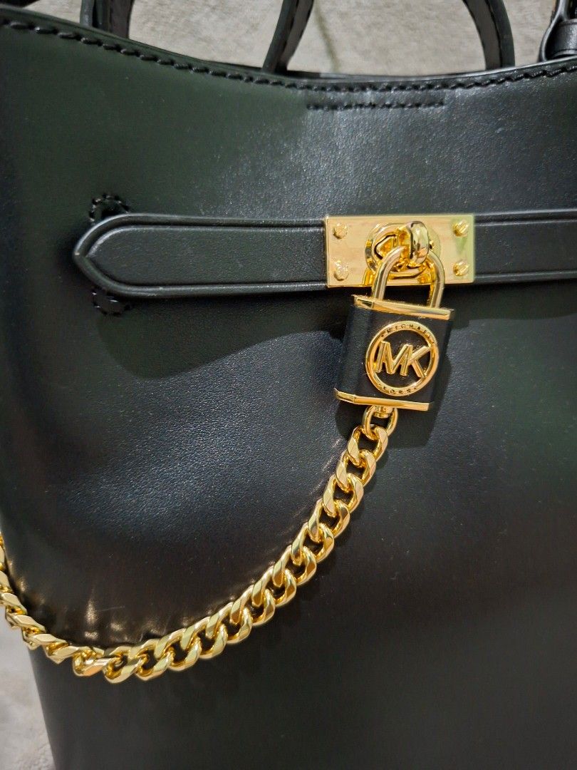 Michael Kors Hamilton Legacy Bucket Bag (Category: Luxury Bags & Wallets) located in Las Pinas. Submitted by ronabelles (Listing ID 1453517330, Image 2). Description: - Michael Kors Hamilton Legacy Bag - Medium Messenger Style - Genuine Black Leather - Gold Hardware & Chain Detail - Brand New with Original Tags - Never Used - Original MSRP: $498.00.