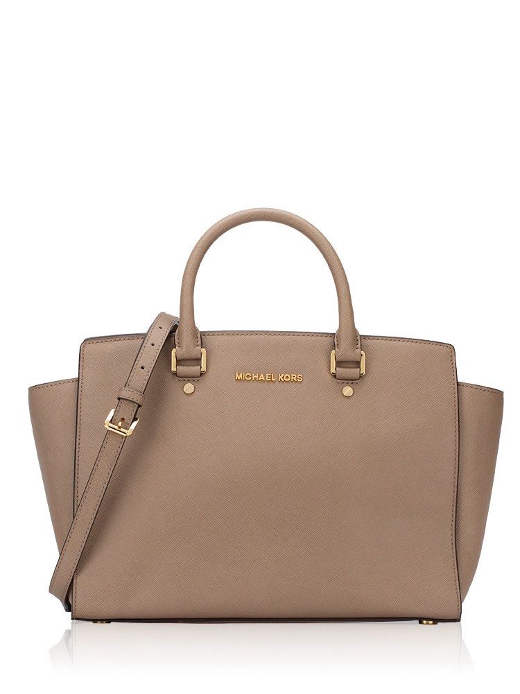 Michael Kors Selma Leather Large in Dark Dune (Category: Luxury Bags & Wallets) located in Paranaque City. Submitted by joymrtnz (Listing ID 1453447271, Image 1). Description: - Orig Michael Kors tote bag in a chic taupe color. - Crafted from durable Saffiano leather. - Elegant gold hardware details. - Includes a convenient detachable shoulder strap. - Ample interior space, ideal for carrying your essentials. - Perfect for both professional setti