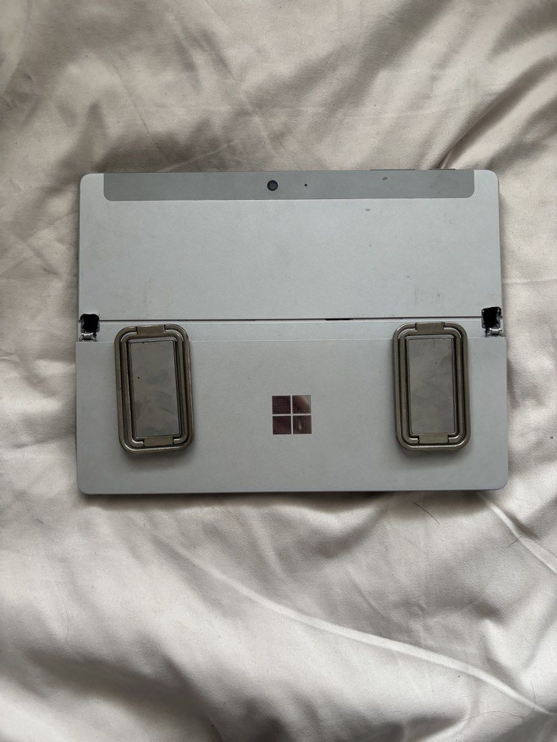 Microsoft Surface Go Tablet with Keyboard (Category: Laptops & Notebooks) located in Taguig. Submitted by arcjvcs (Listing ID 1453503507, Image 3). Description: - Microsoft Surface Go tablet - Includes grey fabric keyboard cover - Device is in setup mode, ready for a new user - Ideal for work or school - Lightweight and portable design.