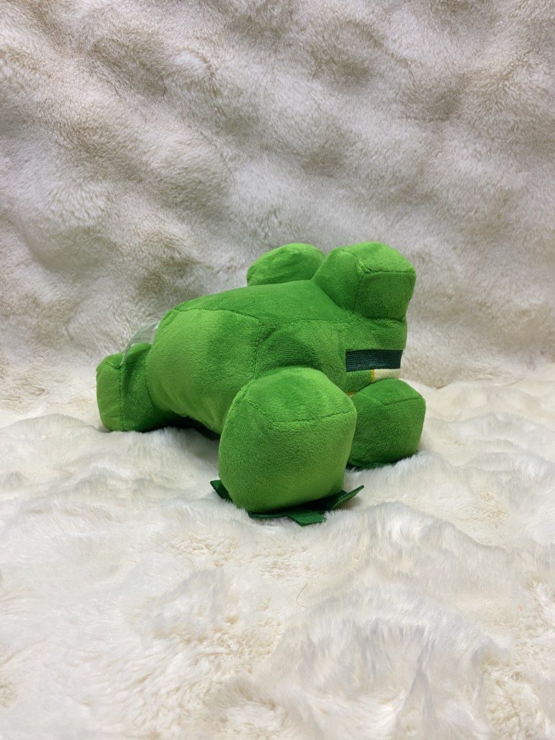 Minecraft Frog Plush Toy (Category: Plushies & Soft Toys) located in Kalibo. Submitted by ollie_stuffshop (Listing ID 1453451116, Image 2). Description: 16cm x 23.5cm x 18cm Before you send your inquiries: ❗️Last Price is already posted ❗️Manage your expectations, WYSIWYG ❗️May need washing ❗️Shipping day is every Sunday - Adorable green frog plush toy - Minecraft-inspired design - Super soft and squishy texture - Ideal gift for fans - Looking fo