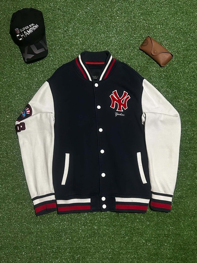 MLB New York Yankees Embroided Navy/White Varsity Jacket (Category: Coats, Jackets and Outerwear) located in Cebu City. Submitted by thhypfl (Listing ID 1453552620, Image 1). Description: MLB New York Yankees Embroided Navy/White Varsity Jacket Width:20.5 Length:25 Fittings:L Issue:Stains(Barely Noticeable),Stitching Cuts Color Rate:9/10 Condition:8.5/10 800+SF.