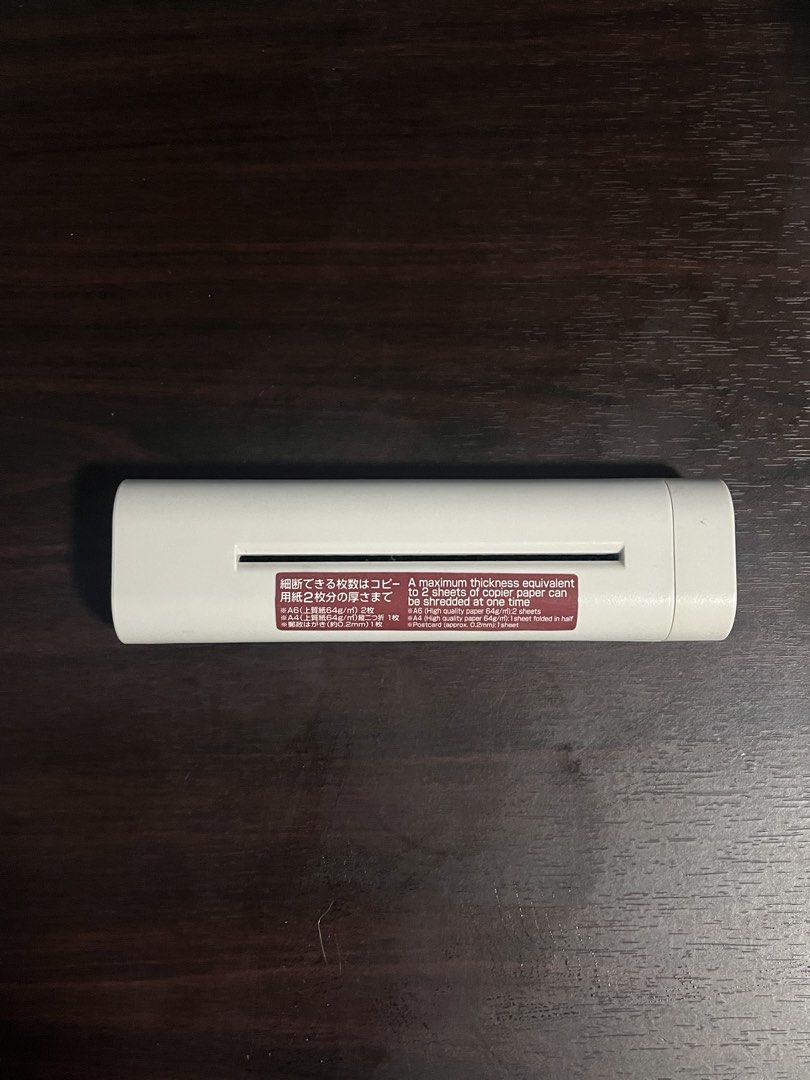 MUJI Portable Manual Paper Shredder (Category: Craft Supplies & Tools) located in Manila. Submitted by carmiscloset (Listing ID 1453565027, Image 1). Description: - Handheld paper shredder for easy document disposal. - Shreds up to 2 sheets of copier paper at once. - No batteries or electricity required – just turn the knob! - Compact design for convenient storage. - Perfect for personal and home use..