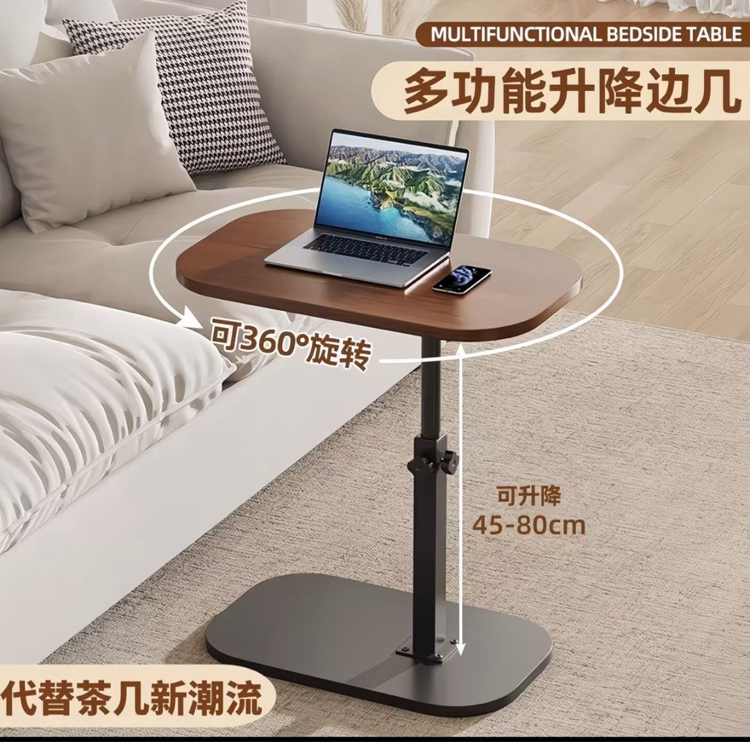 Multifunctional Adjustable Height Rotating Bedside Table (Category: Tables & Sets) located in Singapore. Submitted by danlim65 (Listing ID 1453588134, Image 1). Description: - Rotates 360 degrees - Height adjustable (45cm - 80cm) - Ideal for laptop or snacks in bed - Stable base - Stylish wood-look tabletop - Modern bedroom furniture.