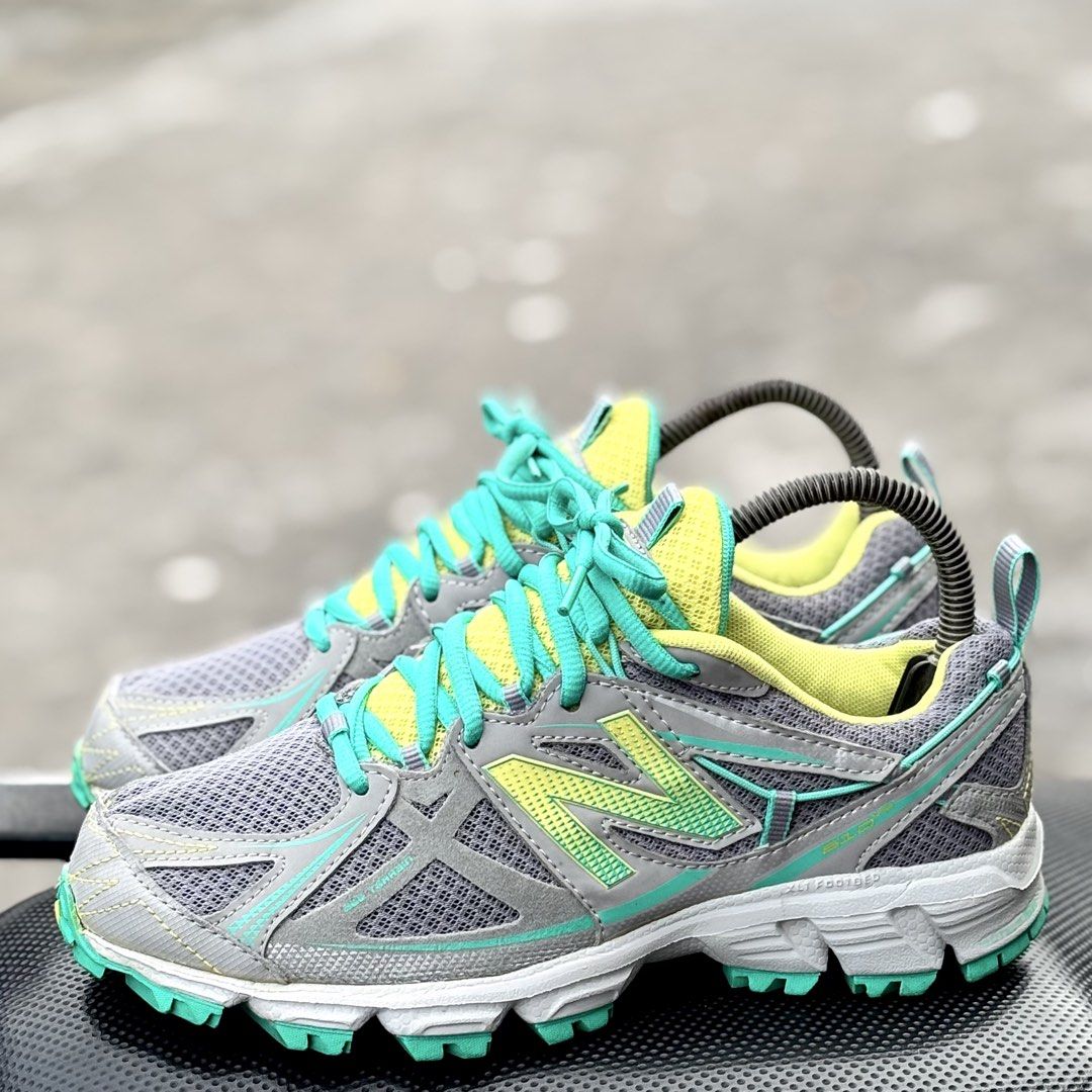 New Balance 610 Womens (Category: Sneakers) located in San Fernando. Submitted by kickslocker (Listing ID 1453556896, Image 2). Description: - Brand: New Balance - Model: 610 - Type: Women's Running Shoes - Size: 6.5 US (23.5cm) - Color: Grey with neon yellow and teal accents - Condition: Excellent, worn only a few times - Best for: Trail running or everyday wear.