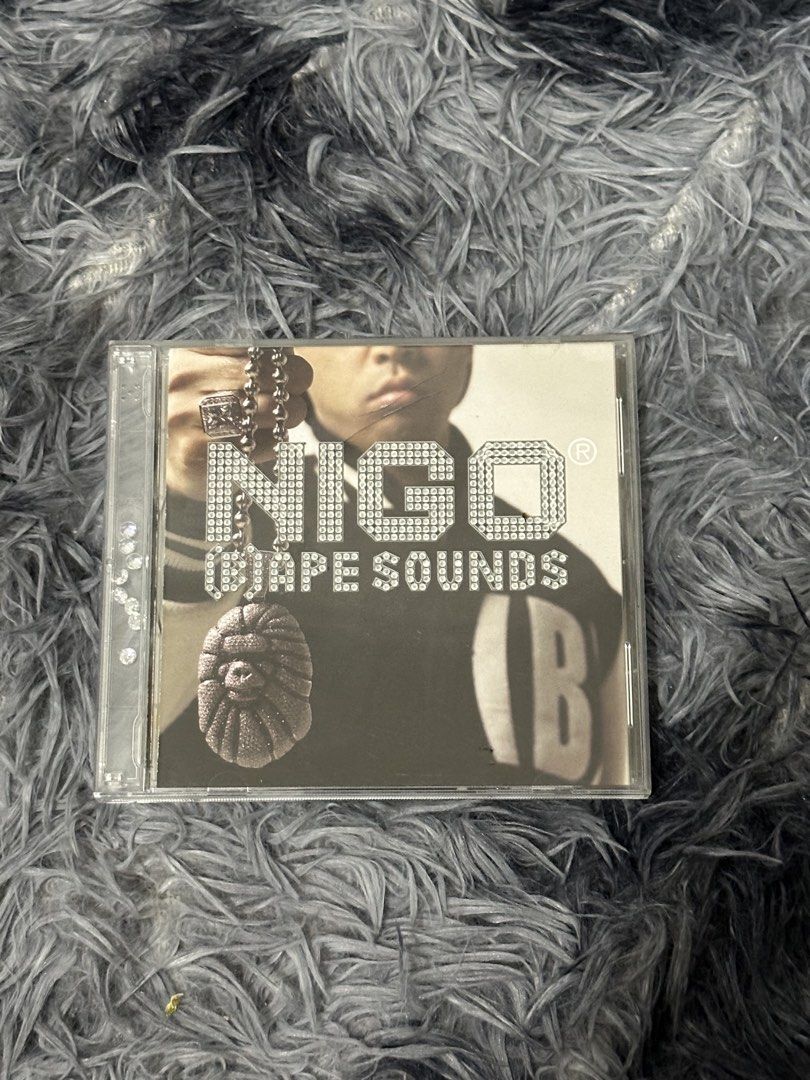 NIGO BAPE SOUNDS CD (Category: CDs & DVDs) located in Manila. Submitted by markjason420 (Listing ID 1453578298, Image 1). Description: - Nigo Bape Sounds CD - Features tracks: 'Superstition', 'Planet of the Apes' - Collaborations with Pharrell Williams and Kanye West - Essential collection for Bape fans - Includes original booklet and CD.