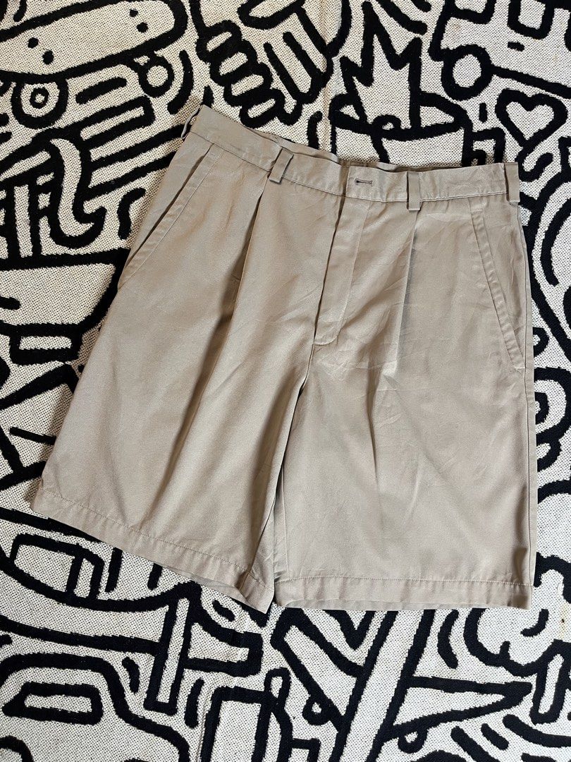 Nike Golf Beige Pleated Shorts Size 32 (Category: Shorts) located in Silang. Submitted by yusthrift (Listing ID 1453513318, Image 1). Description: - Beige Nike Golf Shorts - Size: 32 waist - Design: Pleated front - Closure: Button and zip - Pockets: Two side, two back - Ideal for: Golfing or casual wear - Features: Comfortable fit 15.5 inc waistline 20 inc length 11.5 inc leg opening Issue: Missing 1 button on waist On last pic .