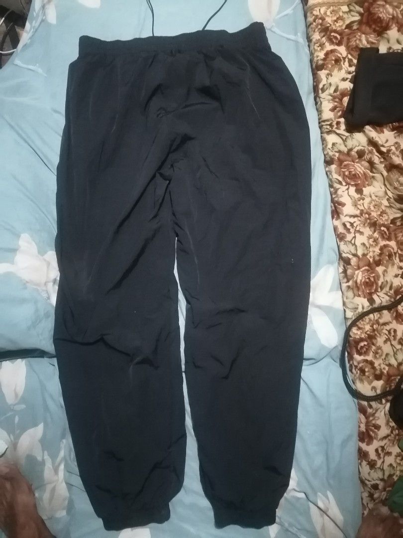 Nike track jogger pants (Category: Joggers) located in San Carlos City. Submitted by apyogone (Listing ID 1453454709, Image 2). Description: Nike track jogger pants Excellent condition No issue Color rate 9.9.