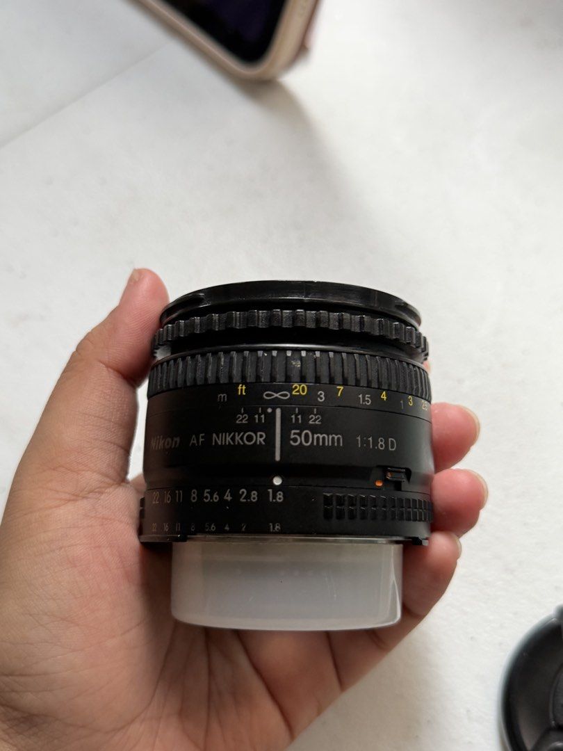Nikon 50mm 1.8 D (Category: Cameras) located in Bulacan. Submitted by baral_ailish (Listing ID 1453527895, Image 2). Description: NIKON LENS 50mm 1.8 D Negotiable ! - has scratches on edges - no haze on lens - scratches on back glass - needs cleaning.