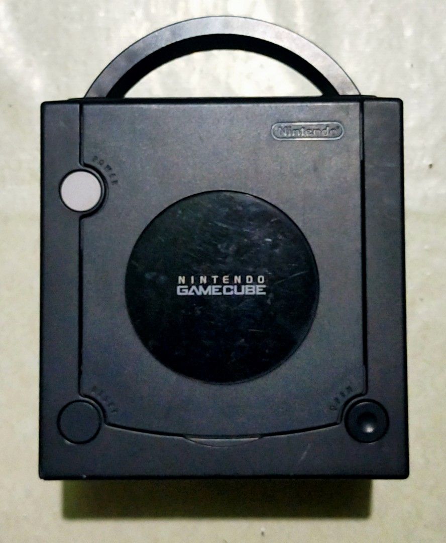 Nintendo GAMECUBE (Category: Nintendo) located in Manila. Submitted by elilee_80 (Listing ID 1453524845, Image 1). Description: FOR SALE! Nintendo GAMECUBE (Black) UNTESTED wala kasi accessories kasama! WALANG SIGN NG DAMAGE/ CORROSION/ REPAIR Etc. MAKINIS PA! Imported from japan In good condition AS-IS! 1,500php PAYMENT: Gcash/Cebuana SHIPPING: LBC/ J&T PICKUP: Lalamove/Grab/Mr.Speedy/Tok-Tok! MEETUP: SM angono.