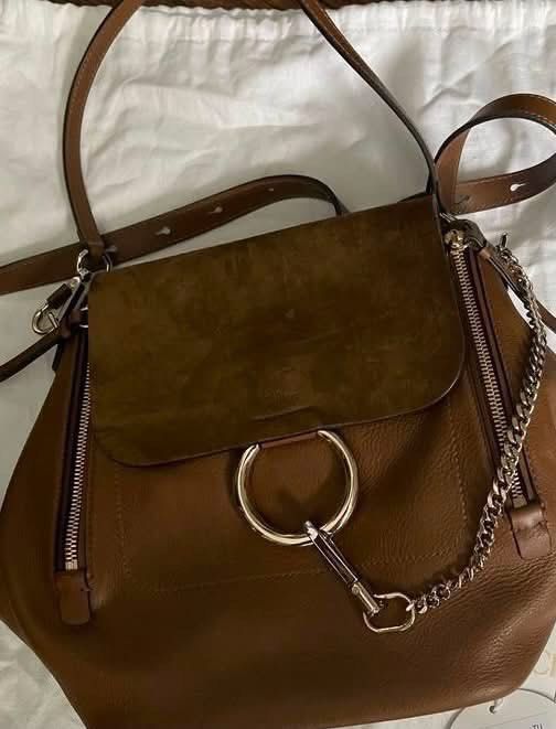 OG Chloe Faye Backpack (Category: Luxury Bags & Wallets) located in Manila. Submitted by eunoia67 (Listing ID 1448841524, Image 1). Description: MAJOR ISSUE: napigtas tag - Genuine brown leather shoulder bag - Elegant suede flap with front ring detail - Functional side zippers - Chic chain strap - Crafted in Italy - 100% AUTHENTIC but no box or dust bag etc.