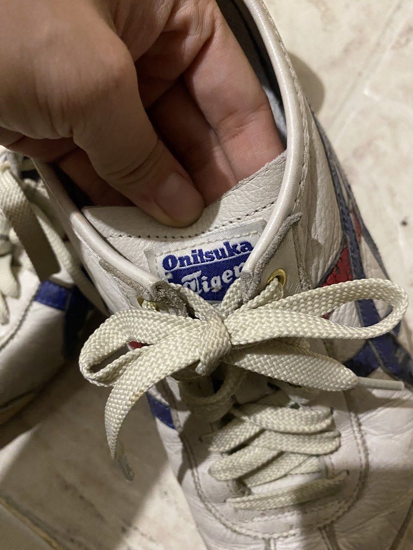 Onitsuka Tiger White Blue Red Sneakers Size 44 (Category: Sneakers) located in Manila. Submitted by emyrosecat28024 (Listing ID 1453593757, Image 2). Description: - Classic Onitsuka Tiger sneakers - Color: White with blue and red stripes - Size: 44 EU / 28cm - Condition: Medyo naangat na yung soles Negotiable!!.