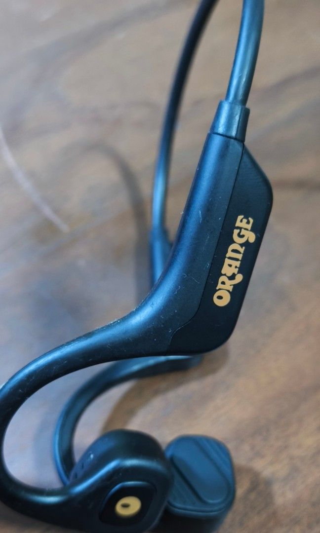 ORANGE 0 BONE headset (Category: Earphones) located in Quezon City. Submitted by gametz (Listing ID 1453617582, Image 2). Description: Original item pre loved item. - this is one of THE , THE BEST HEADPHONES YOULL EVER USE IN LAND OR WATER.... Authentic ORANGE O BONES headphone Orange O Bones bone conduction headphones featuring a black design and open-ear technology. Technology: Uses bone conduction to transmit sound, allowing you to hear surrou