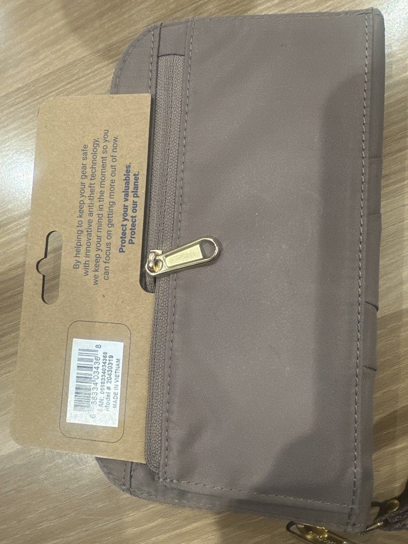 Pacsafe Citysafe CX RFID Blocking Travel Wallet (Category: Wallets & Card holders) located in Quezon City. Submitted by geeceegee (Listing ID 1453529457, Image 2). Description: - Pacsafe travel wallet - RFID blocking technology for security - Made with recycled polyester - Multiple card slots - Internal zippered coin pocket - Comes with original tag - Ideal for travel and everyday use.