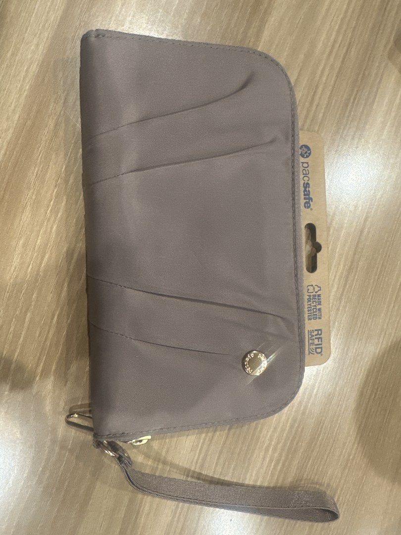 Pacsafe Citysafe CX RFID Blocking Travel Wallet (Category: Wallets & Card holders) located in Quezon City. Submitted by geeceegee (Listing ID 1453529457, Image 1). Description: - Pacsafe travel wallet - RFID blocking technology for security - Made with recycled polyester - Multiple card slots - Internal zippered coin pocket - Comes with original tag - Ideal for travel and everyday use.