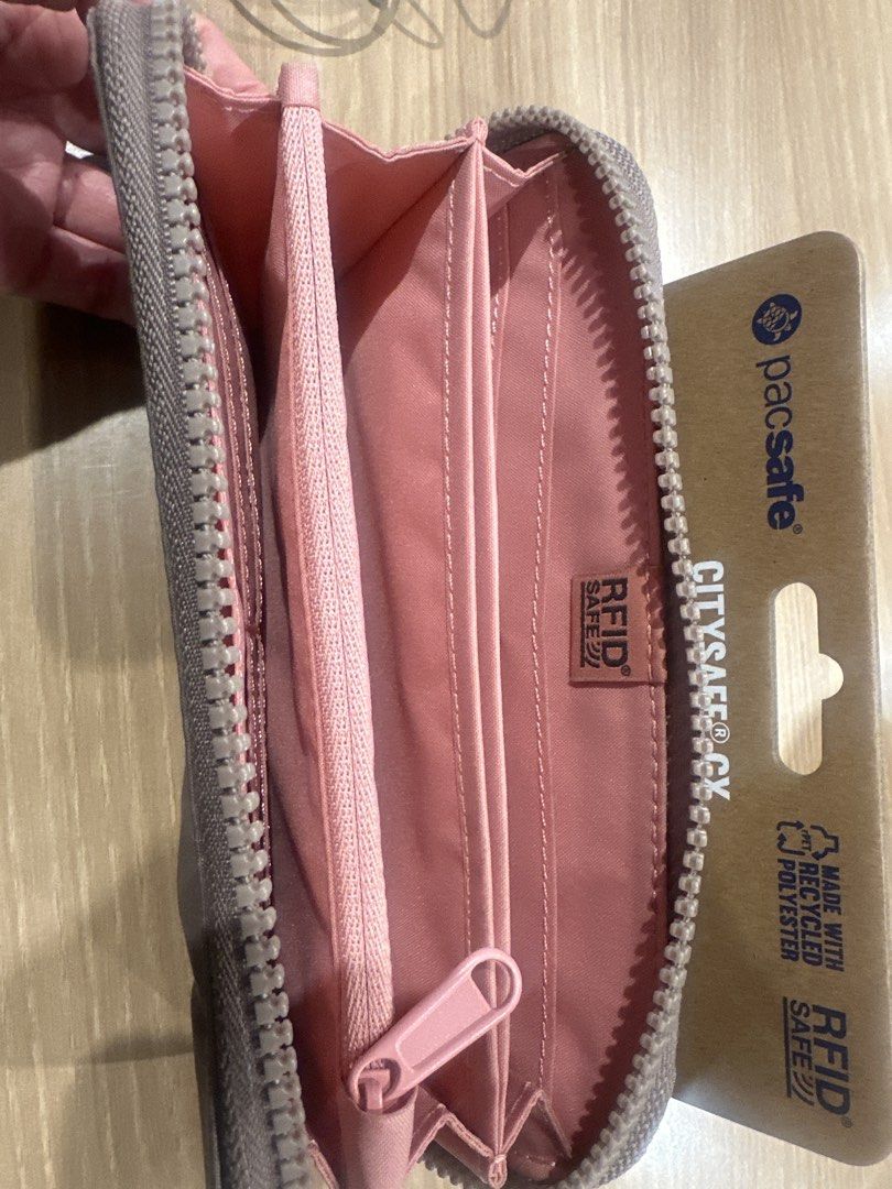 Pacsafe Citysafe CX RFID Blocking Travel Wallet (Category: Wallets & Card holders) located in Quezon City. Submitted by geeceegee (Listing ID 1453529457, Image 3). Description: - Pacsafe travel wallet - RFID blocking technology for security - Made with recycled polyester - Multiple card slots - Internal zippered coin pocket - Comes with original tag - Ideal for travel and everyday use.