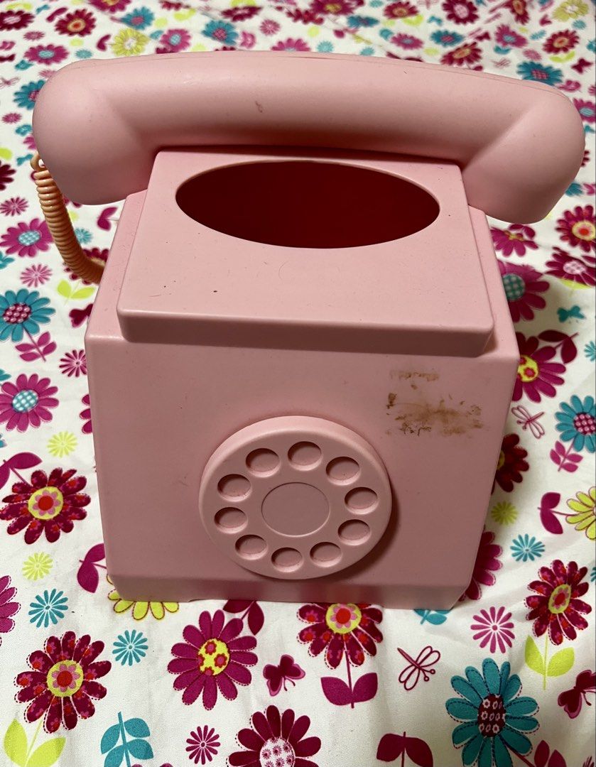 Pink Retro Rotary Phone Tissue Box Holder (Category: Other Home Decor) located in Mandaluyong City. Submitted by lynndco (Listing ID 1453621953, Image 1). Description: - Cute pink tissue box holder - Shaped like a retro rotary phone - Handset rests on top, dial is decorative - Adds a fun, vintage vibe to any room - Perfect for desks or vanities .