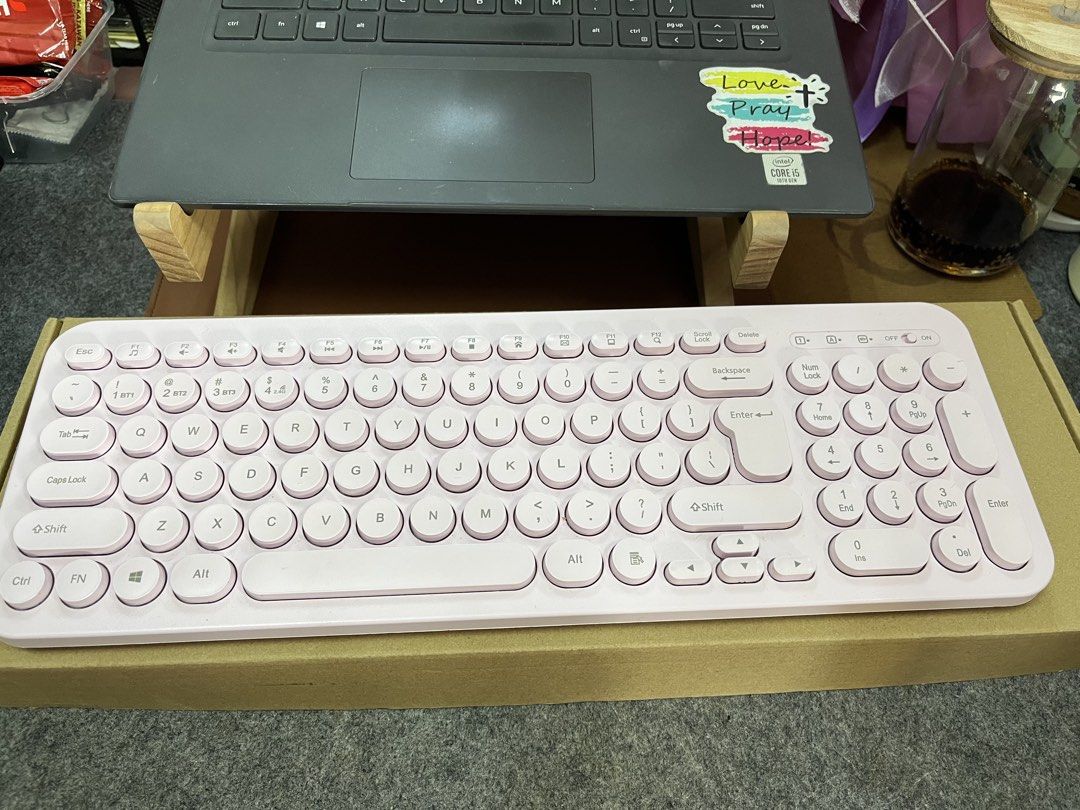 Pink Wireless Keyboard (low profile caps) (Category: Computer Keyboard) located in Quezon City. Submitted by rebagged.mnl (Listing ID 1453502157, Image 1). Description: Almost Brand New Rfs: Decluttering (naadik ako sa keyboard 🤣 - Adorable pink wireless keyboard - Multiple Bluetooth connection options (BT1, BT2, BT3) - Features cute, comfortable round keys - Ideal for achieving a clean and aesthetic desk setup - Fully functional and works well.
