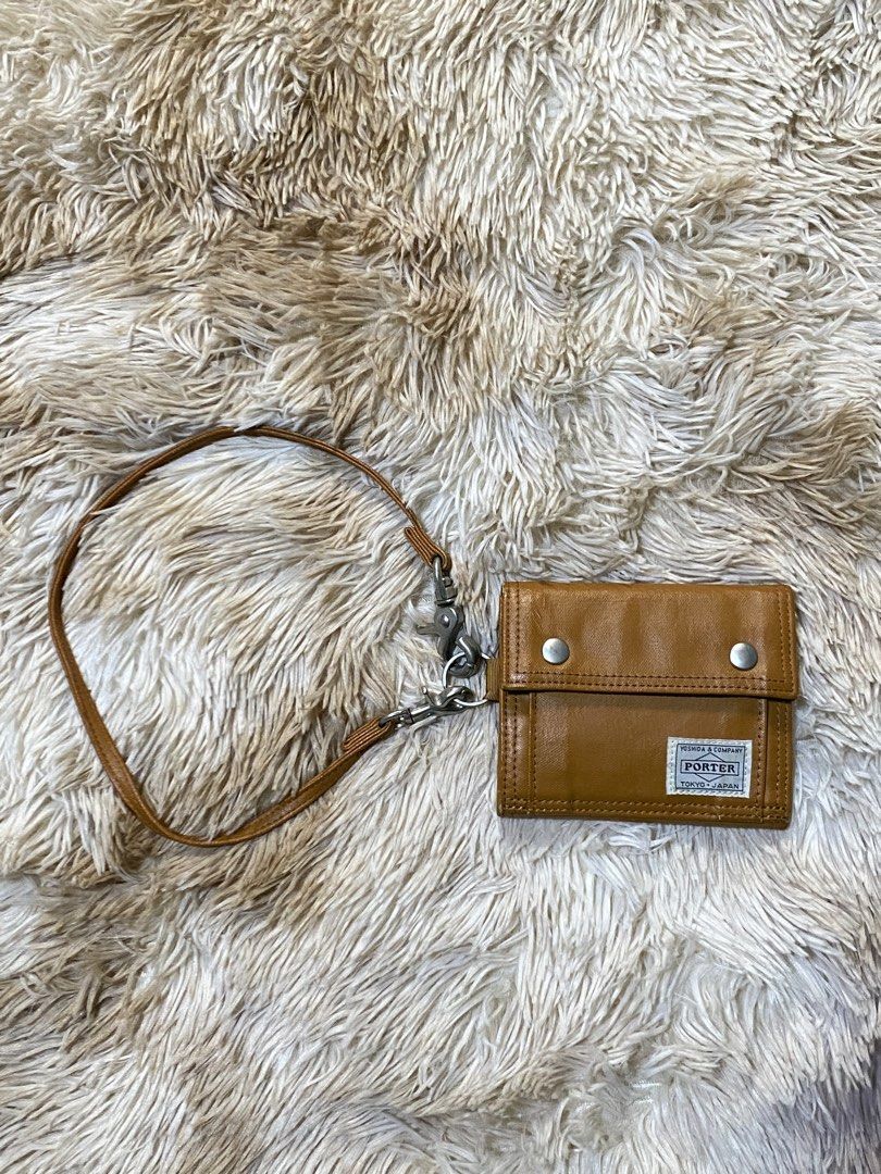 Porter Wallet with handle (Category: Wallets & Card Holders) located in Santa Ana. Submitted by tunes_vtg (Listing ID 1453511631, Image 1). Description: Porter wallet Excellent Condition Minor Issue see ON pic Authentic ₱1500+Sf.