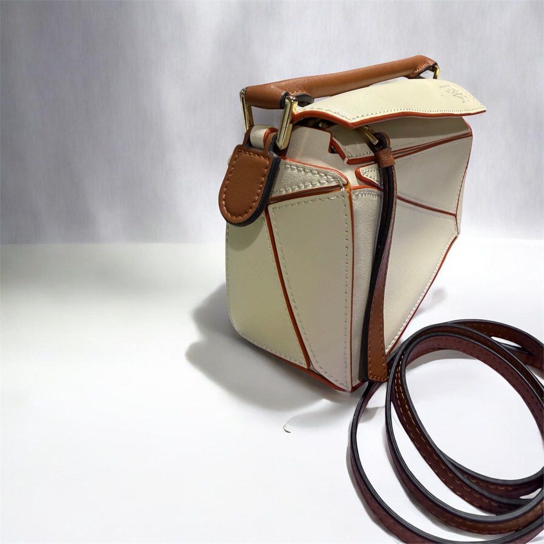 Puzzle mini (Category: Luxury Bags & Wallets) located in Quezon City. Submitted by kcm_bags (Listing ID 1453530780, Image 3). Description: Preloved Coded Like new.