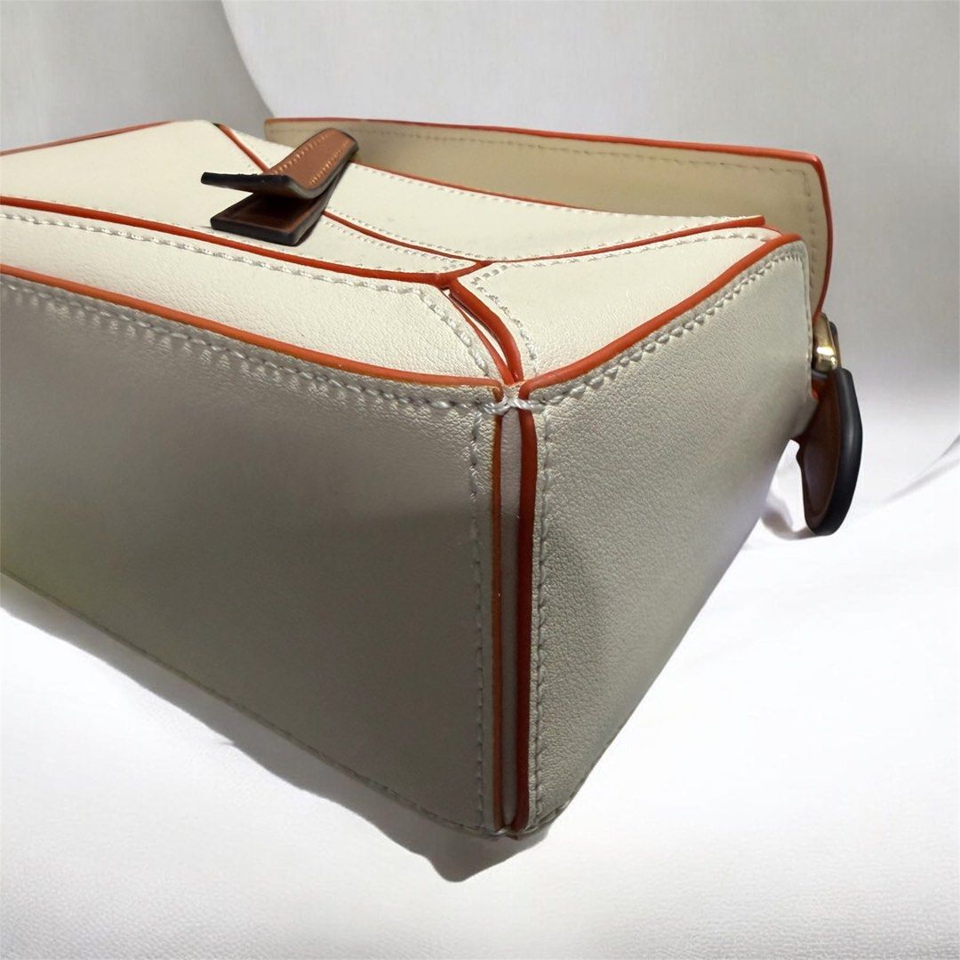 Puzzle mini (Category: Luxury Bags & Wallets) located in Quezon City. Submitted by kcm_bags (Listing ID 1453530780, Image 2). Description: Preloved Coded Like new.