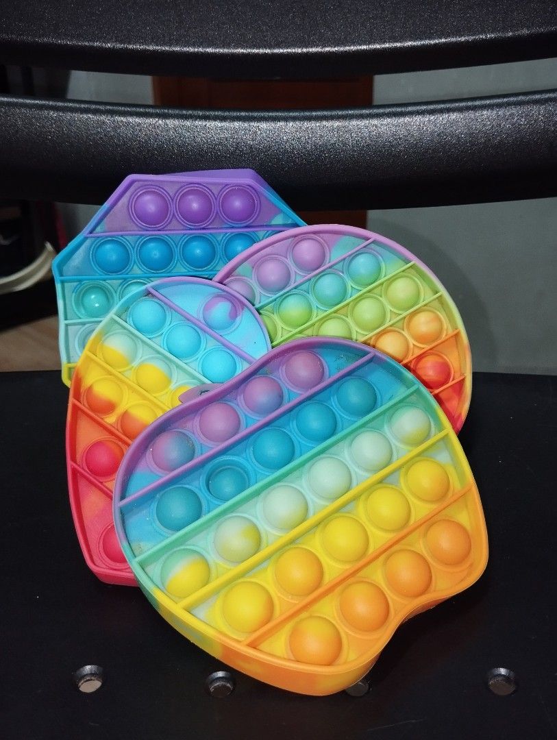 Rainbow Heart & Hexagon Pop It Fidget Toys (Category: Kids Toys) located in Pasig City. Submitted by cityshopperph (Listing ID 1453433948, Image 1). Description: - Fun rainbow colored pop it fidget toys. - Includes heart and hexagon shapes. - Great for stress relief and sensory play. - Enjoy the satisfying popping sound and feel. - Perfect for both kids and adults. - Get yours today! take all .