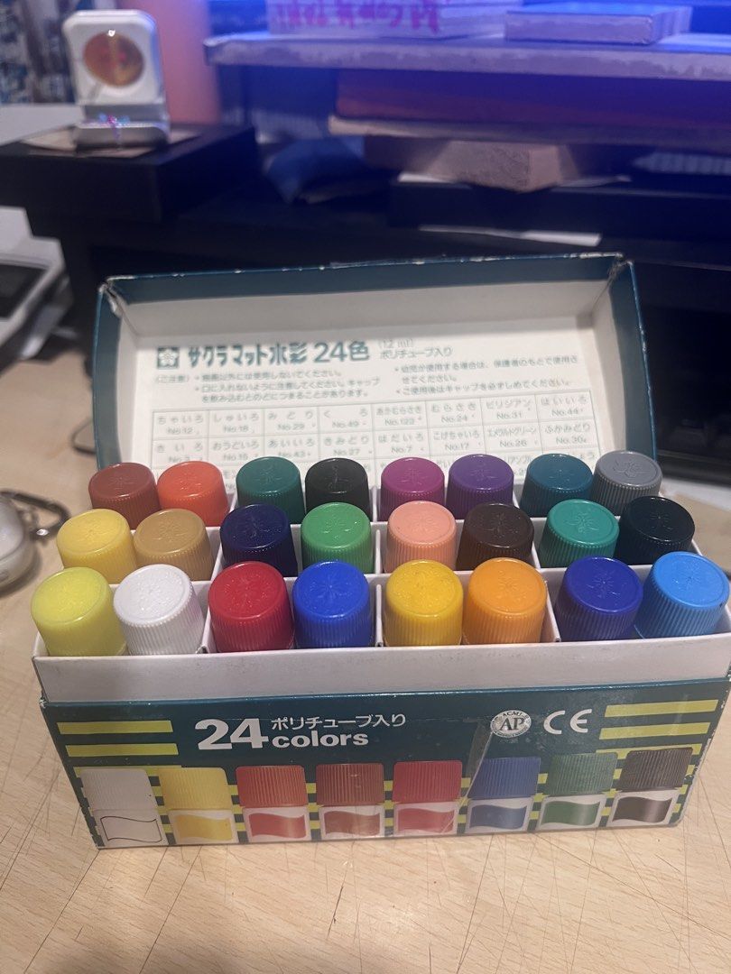 Sakura Mat Water Colors 24 Colors Set (Category: Craft Supplies & Tools) located in Manila. Submitted by exoitedd (Listing ID 1453591448, Image 1). Description: - Sakura Mat Water Colors set - Includes 24 tubes of paint - Each tube contains 12ml - Wide range of colors: lemon yellow, various greens, blues, reds, and more - Ideal for all your art projects - Comes in its original packaging.