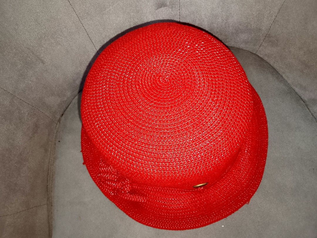 Scala Red Woven Sun Hat with Bow Detail (Category: Hats & Beanies) located in Binangonan. Submitted by yuristalin888 (Listing ID 1453563288, Image 2). Description: - Brand: Scala - Color: Red - Style: Classic sun hat - Material: Tightly woven straw-like texture - Features: Cute bow detail on the side - Occasion: Ideal for sunny days out - Size: Fits most adult head sizes.