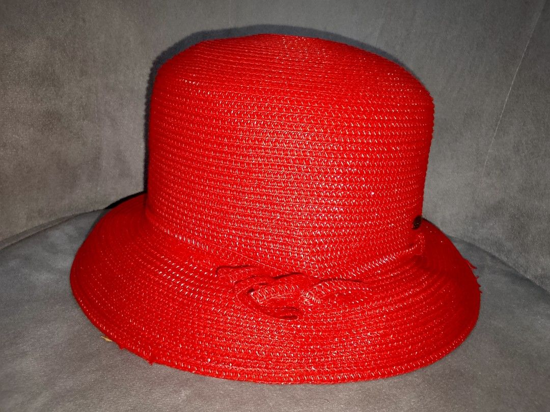 Scala Red Woven Sun Hat with Bow Detail (Category: Hats & Beanies) located in Binangonan. Submitted by yuristalin888 (Listing ID 1453563288, Image 3). Description: - Brand: Scala - Color: Red - Style: Classic sun hat - Material: Tightly woven straw-like texture - Features: Cute bow detail on the side - Occasion: Ideal for sunny days out - Size: Fits most adult head sizes.