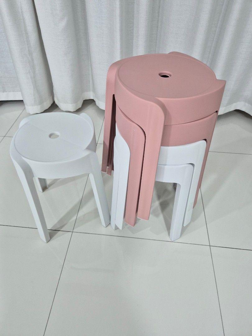 Stacking Stools (5 pcs) (Category: Chairs) located in Singapore. Submitted by icognita99 (Listing ID 1453593705, Image 1). Description: - Set of 5 stools (5 pieces at $20.00) - 2 pink, 3 white - Durable plastic construction - Stackable design for convenient storage - Self collection at Yishun Ave 2.