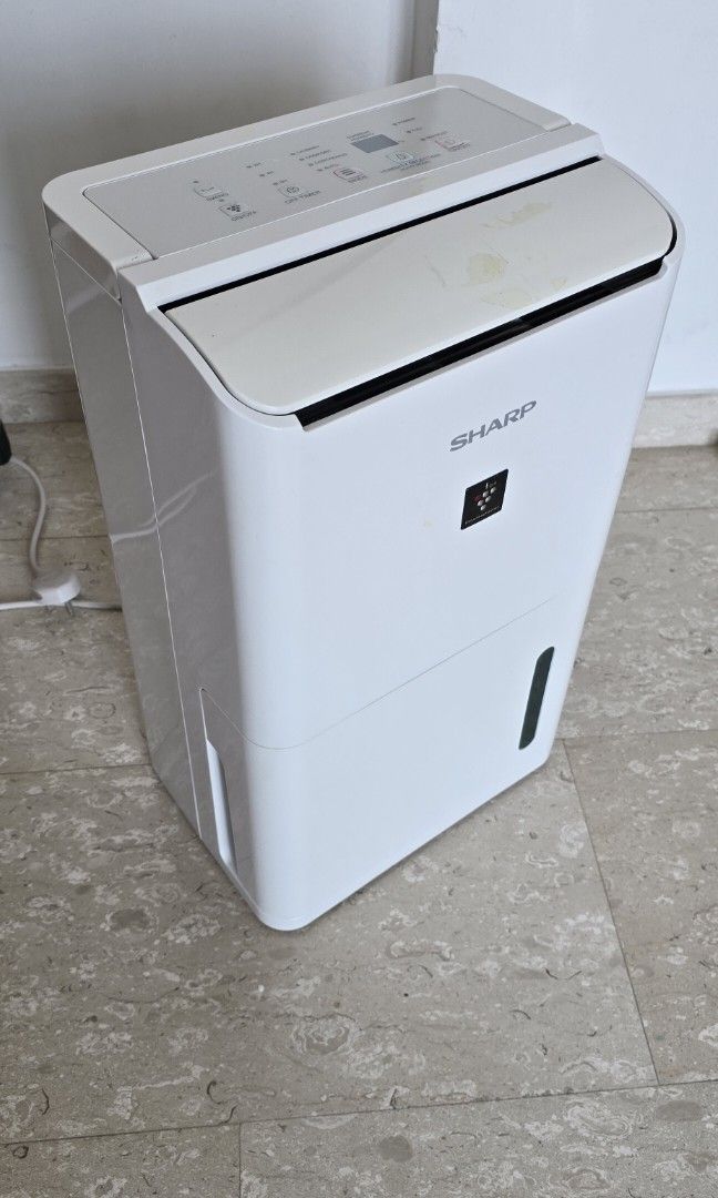 Sharp Dehumidifier (Category: Air Purifiers & Dehumidifiers) located in Singapore. Submitted by attila74 (Listing ID 1453493729, Image 1). Description: Sharp dehumidifier, works perfectly but we are moving and not using it anymore. there is a hose to operate it continuously. No box..