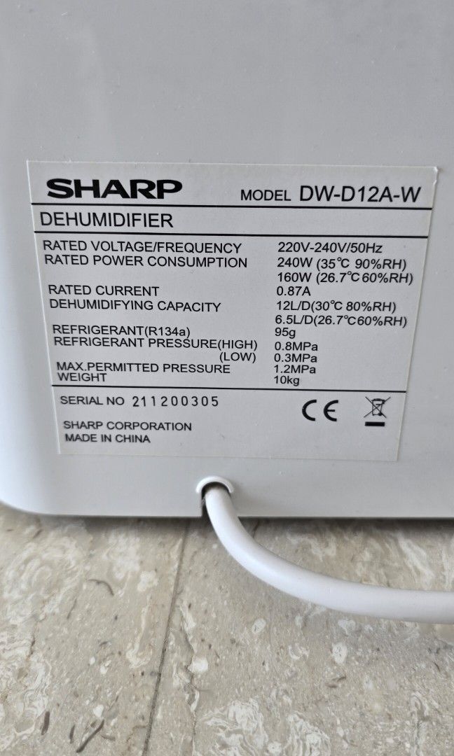 Sharp Dehumidifier (Category: Air Purifiers & Dehumidifiers) located in Singapore. Submitted by attila74 (Listing ID 1453493729, Image 3). Description: Sharp dehumidifier, works perfectly but we are moving and not using it anymore. there is a hose to operate it continuously. No box..