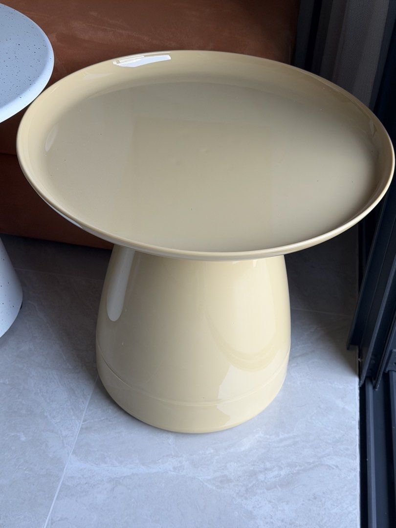 Side Table (Category: Tables & Sets) located in Singapore. Submitted by tikkka (Listing ID 1453434550, Image 1). Description: - Adorable yellow-colored side table - Unique mushroom shape design - Round, slightly curved tabletop - Bulbous, stable base - Ideal for holding drinks or displaying decor - Versatile for living rooms or bedrooms - Simple to wipe clean.