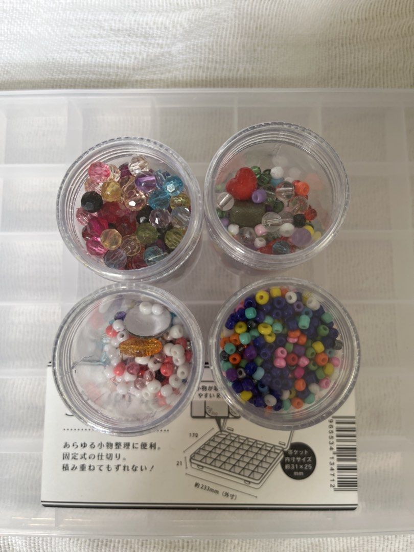 SIKIRI 42 Storage Organizer with Assorted Beads (Category: Storage Boxes & Baskets) located in Manila. Submitted by prima_onda (Listing ID 1453473177, Image 2). Description: - SIKIRI 42 storage box with 42 compartments for organizing small items. - Comes with four small jars filled with assorted colorful beads. - Ideal for crafting and jewelry making projects. - Clear plastic box with a secure lid. - I can add more assorted beads, if you want!! D