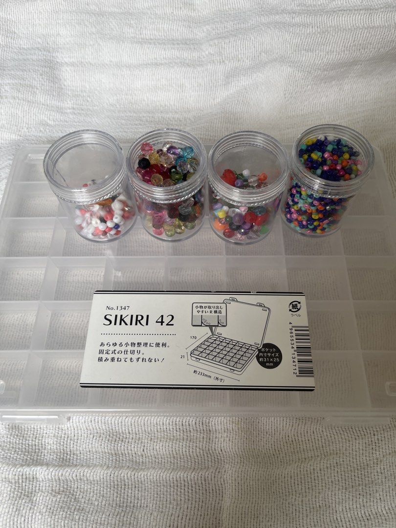 SIKIRI 42 Storage Organizer with Assorted Beads (Category: Storage Boxes & Baskets) located in Manila. Submitted by prima_onda (Listing ID 1453473177, Image 1). Description: - SIKIRI 42 storage box with 42 compartments for organizing small items. - Comes with four small jars filled with assorted colorful beads. - Ideal for crafting and jewelry making projects. - Clear plastic box with a secure lid. - I can add more assorted beads, if you want!! D