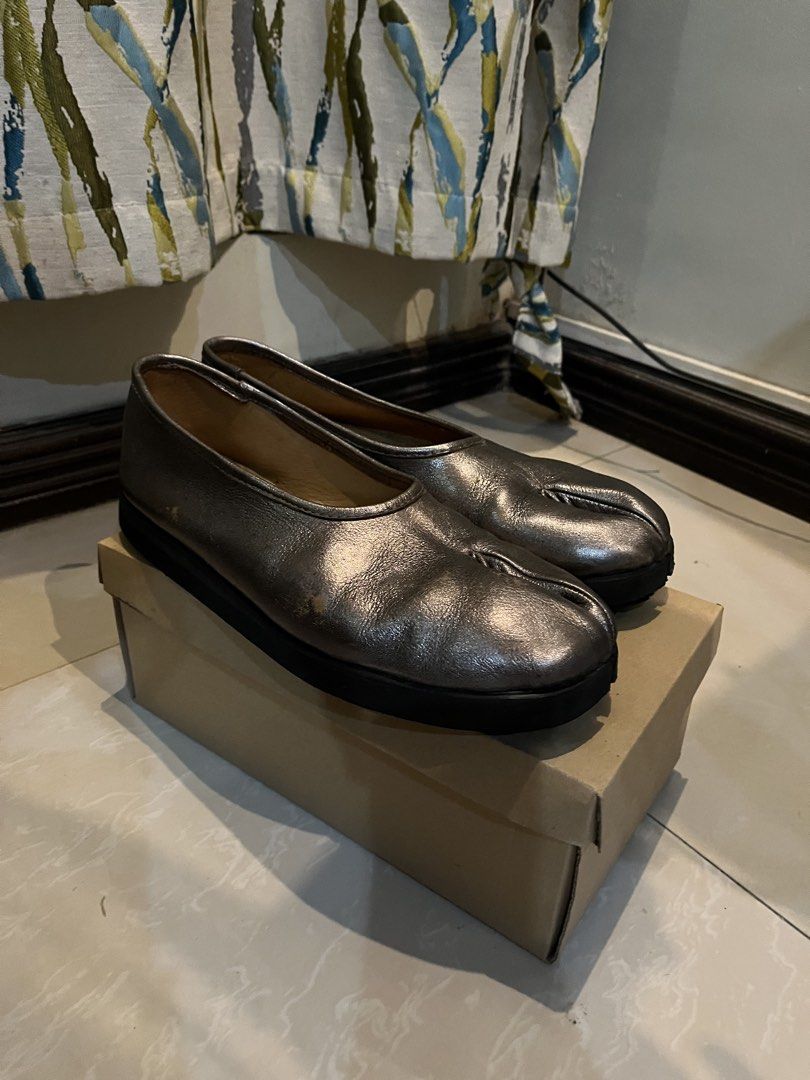 Silver Tabi shoes (Category: Casual Shoes) located in Manila. Submitted by lnceuu (Listing ID 1453615780, Image 2). Description: Silver Tabi shoes - Made by Meraniel Leather - Size 12 - Has minor defects Original price: 3900 Rfs: too big for me overall its a good show to wear, very comfortable. i just don’t like that it is too big for me anymore..