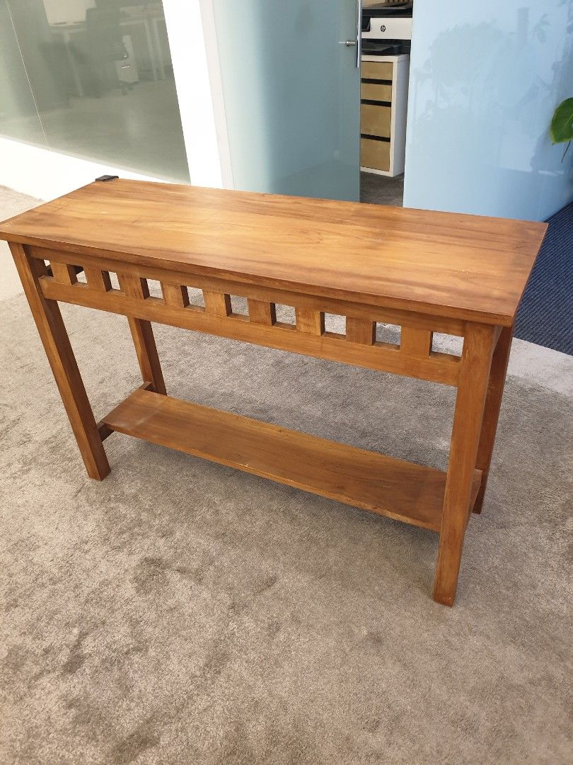 Solid Wood Table (Category: Tables & Sets) located in Singapore. Submitted by bloomwell (Listing ID 1453449658, Image 3). Description: Solid wood console table in good condition $15 each (1 available) Dimensions:- Height: 75cm Length: 110cm Width: 40cm - Sturdy and durable solid wood construction. - Natural wood furniture. - Suitable for entryway table, hallway table, sofa table, display table ✅ Good condition ✅ Fully functional ✅ No major defect