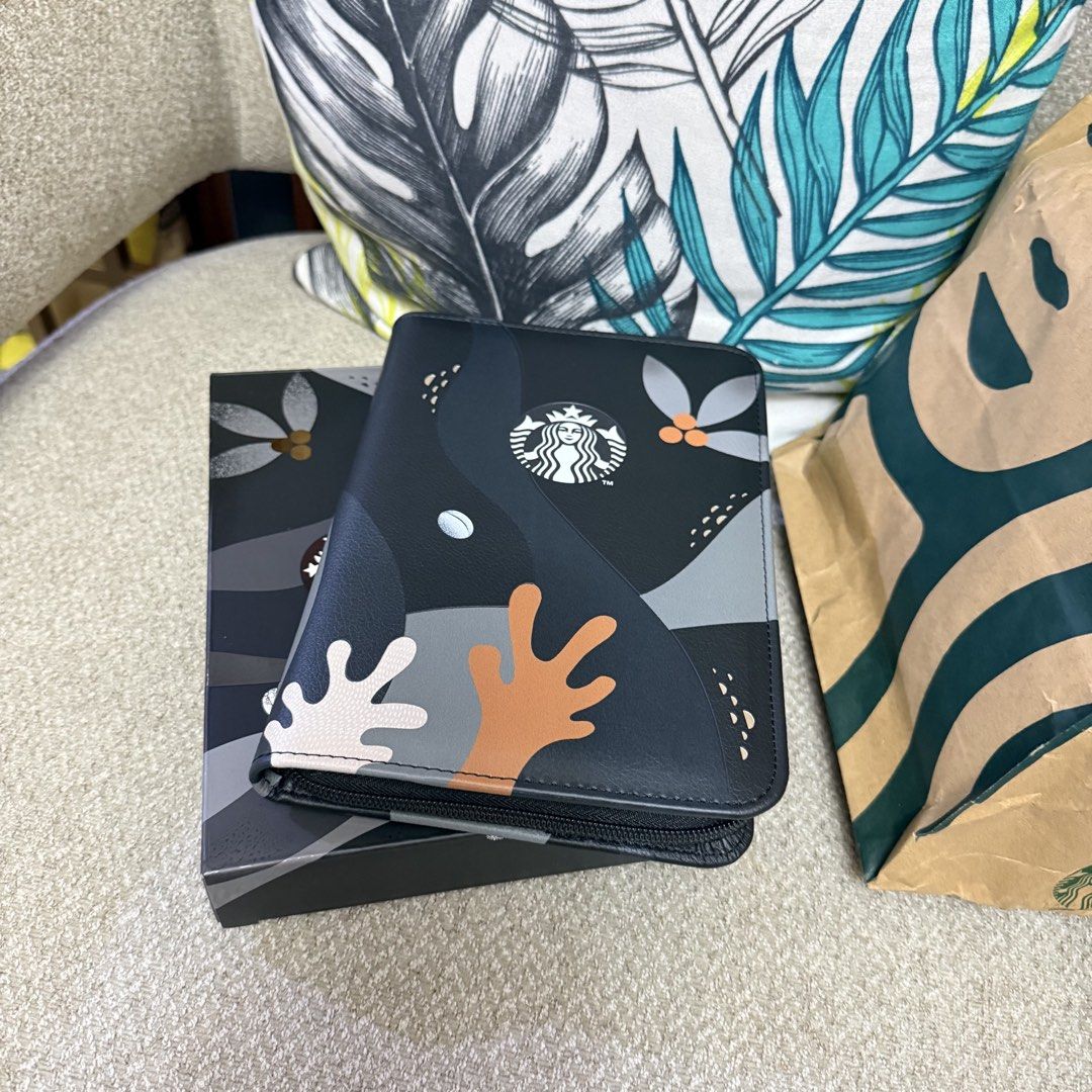 Starbucks Black Planner Organizer with Unique Design (Category: Stationery & School Supplies) located in Lipa City. Submitted by clacla_28 (Listing ID 1453477221, Image 3). Description: - Starbucks Planner/Organizer - Black cover with cool abstract design - Features the iconic Starbucks logo - Comes with its original box - Ideal for organizing notes and plans - A must-have for any Starbucks enthusiast.