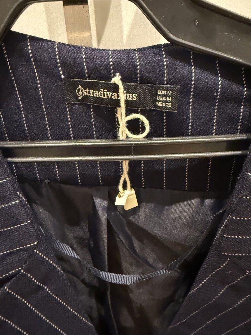 Stradivarius long pinstripe vest (Category: Coats, Jackets and Outerwear) located in Makati City. Submitted by nmvs1 (Listing ID 1453441632, Image 3). Description: New no tag never worn Stradivarius long vest Navy blue and white pinstripe Medium can fit semi large Laid flat Bust 18 inches Waist 19 in Hip 22 inches Length 33 inches.