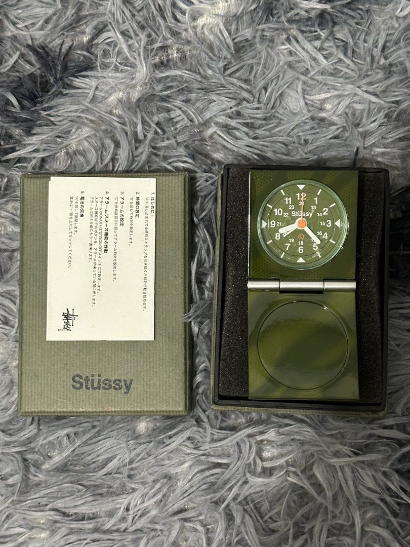 Stussy Camouflage Alarm Clock with Box (Category: Clocks) located in Manila. Submitted by markjason420 (Listing ID 1453583841, Image 1). Description: - Authentic Stussy alarm clock - Stylish camouflage design - Convenient flip-open style - Includes original Stussy box - Comes with instructions - Made in China - Ideal for collectors and unique desk accessories - It’s from around 2003, I believe. The main unit is in very clean condition. The protec