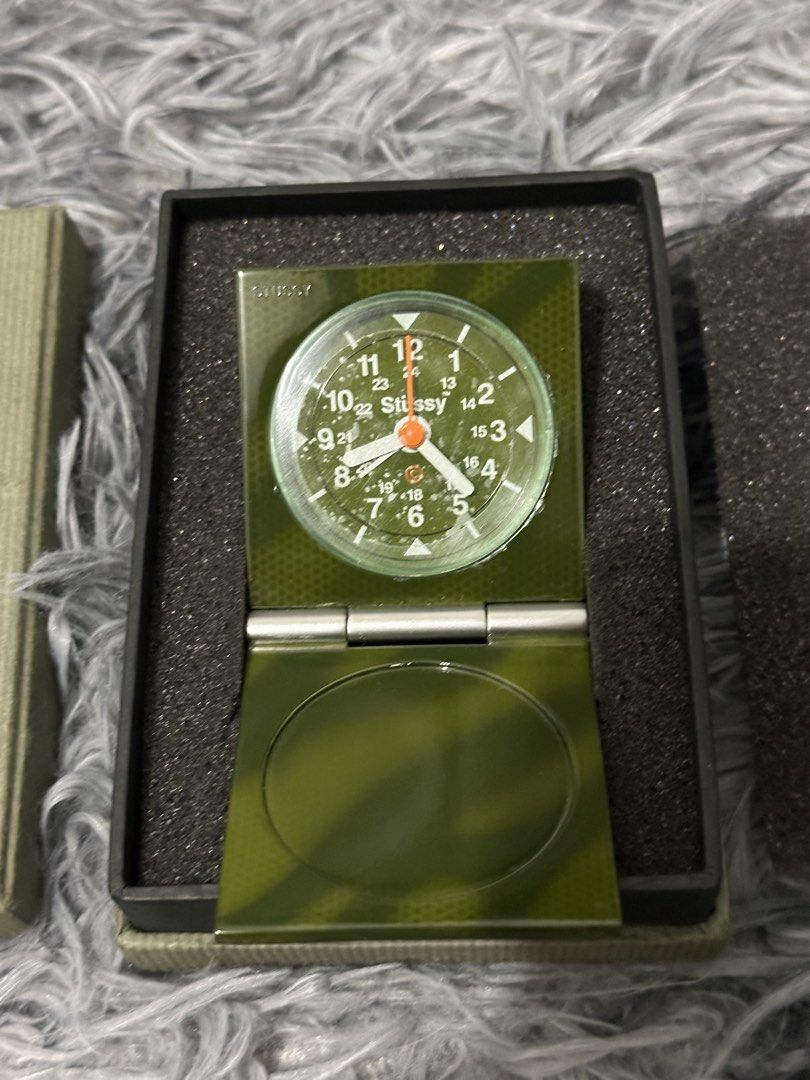 Stussy Camouflage Alarm Clock with Box (Category: Clocks) located in Manila. Submitted by markjason420 (Listing ID 1453583841, Image 3). Description: - Authentic Stussy alarm clock - Stylish camouflage design - Convenient flip-open style - Includes original Stussy box - Comes with instructions - Made in China - Ideal for collectors and unique desk accessories - It’s from around 2003, I believe. The main unit is in very clean condition. The protec