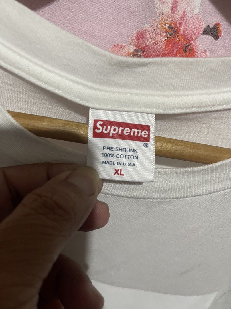 Supreme White Graphic T-Shirt XL (Category: Luxury Apparel) located in Mandaluyong City. Submitted by mark2pac (Listing ID 1453568174, Image 2). Description: - Supreme White T-Shirt - Size: XL - Material: 100% Cotton - Origin: Made in USA - Feature: Pre-shrunk fabric - Perfect for casual wear - Please check photos for detailed condition..