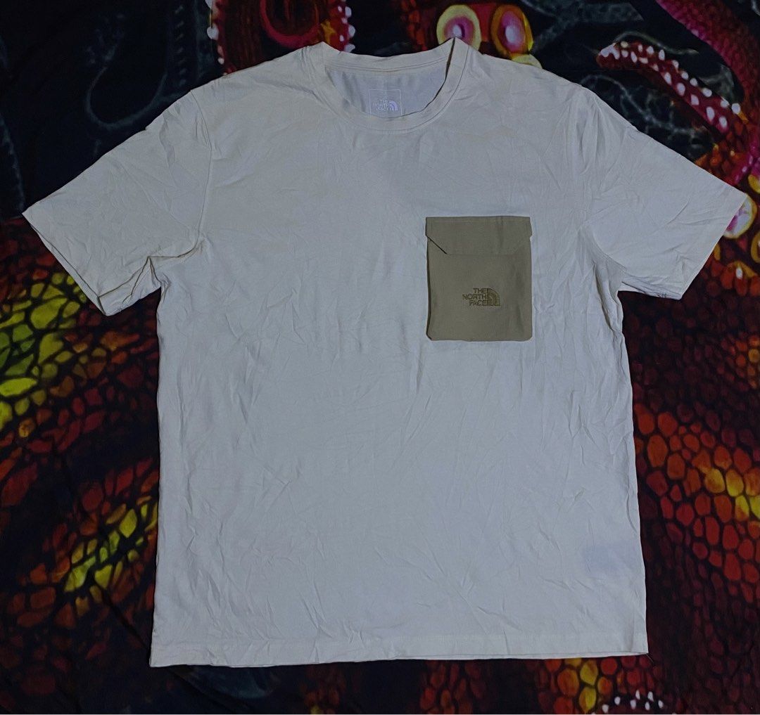 THE NORTH FACE POCKET TEE (Category: Activewear) located in Cebu City. Submitted by tjoafh (Listing ID 1453599625, Image 1). Description: US LARGE ASIA XL 22.5 x 29 NEW CONDITION PARDO CEBU LOC.