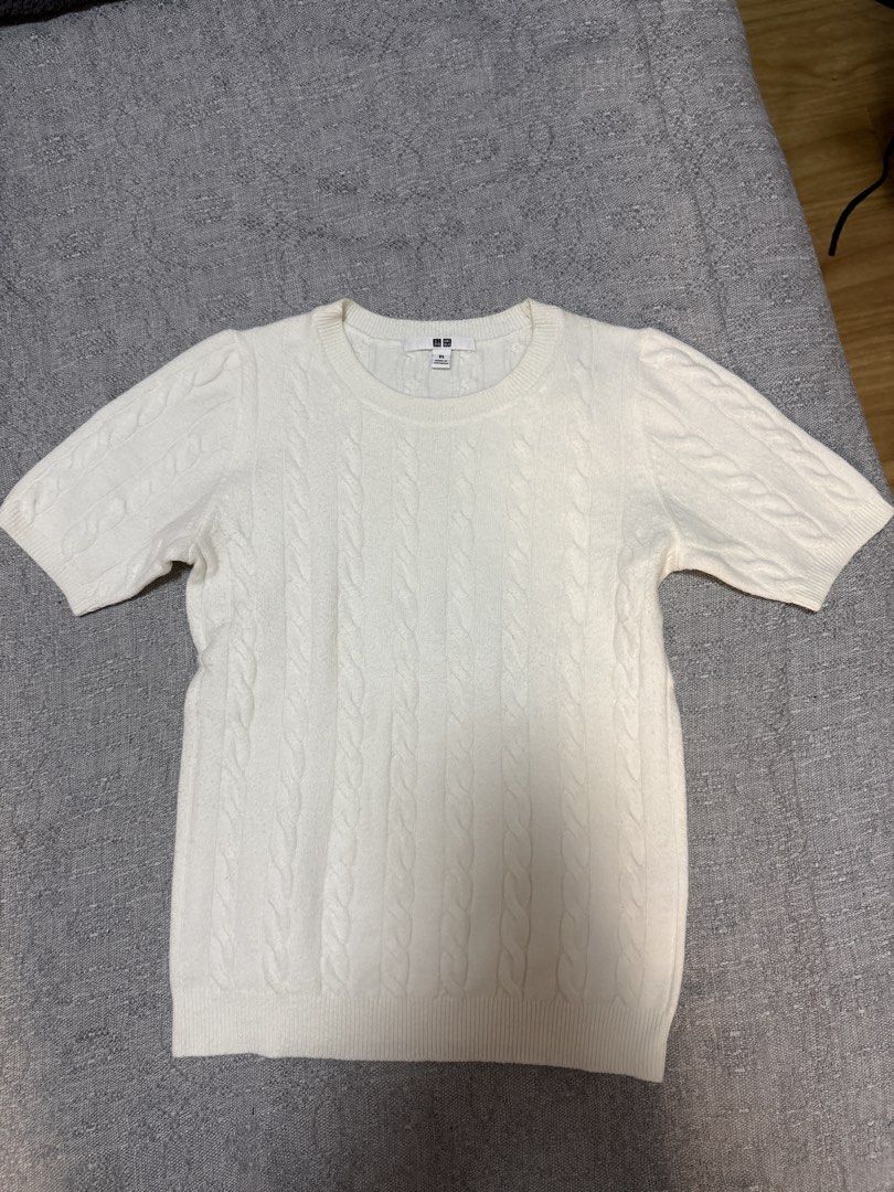 Uniqlo Cable Knit Short Sleeve Sweater (Category: Longsleeves) located in Mandaluyong City. Submitted by xxtin (Listing ID 1453545168, Image 1). Description: - Uniqlo Cable Knit Sweater - Short Sleeves - Crew Neck - Size XS - Used once.