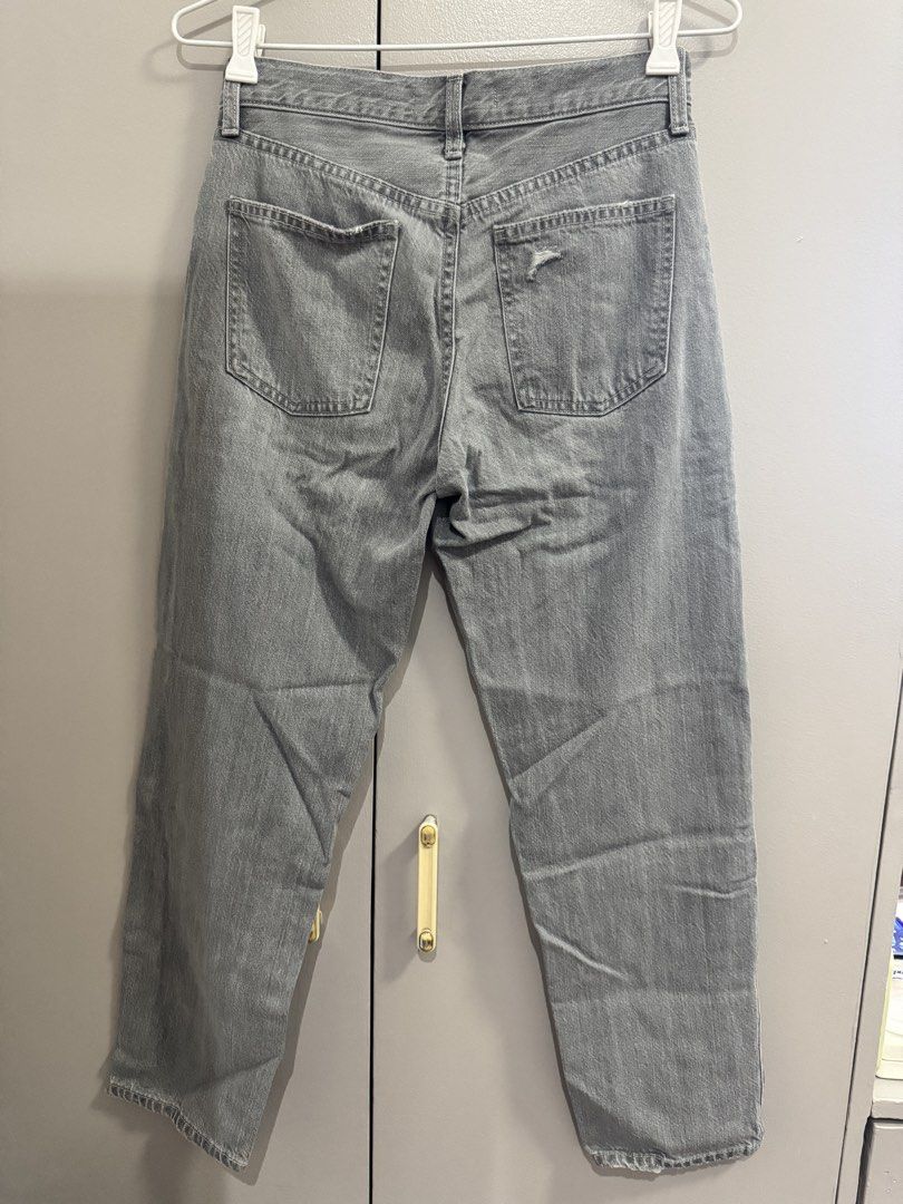 Uniqlo Grey Jeans Size 26 (Category: Jeans) located in Quezon City. Submitted by jaebaeee (Listing ID 1453578640, Image 3). Description: - Brand: Uniqlo - Color: Grey - Size: W-26 L-35 (Uniqlo sizing 22) - Material: Cotton & Tencel Lyocell - Features: Distressed detail on front left & back right pockets, cropped length.