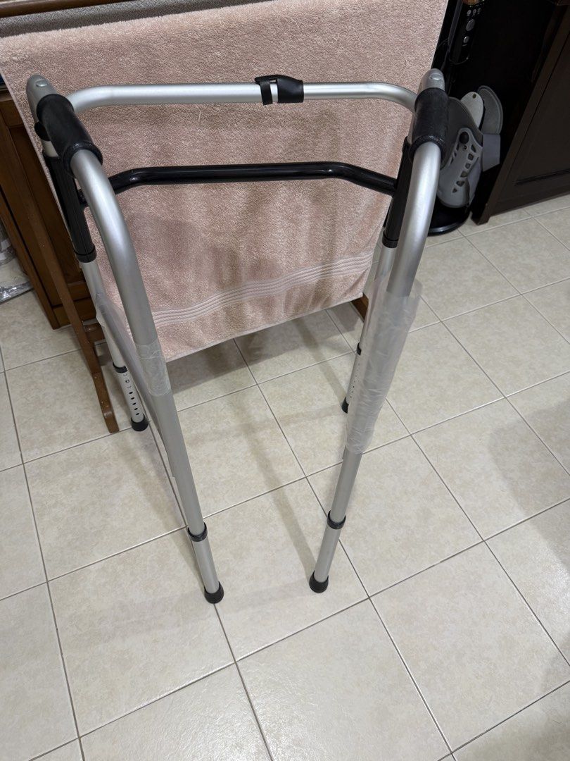 Walker (Category: Other Assistive Aids) located in Singapore. Submitted by nighthawk7278 (Listing ID 1453491861, Image 4). Description: - Lightweight and durable aluminum construction - Designed for enhanced stability and support - Features comfortable, non-slip grip handles - Folds for easy storage and transport - In excellent, brand new condition - Still in original plastic wrapping .