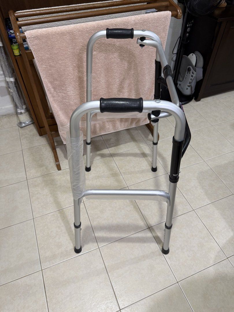 Walker (Category: Other Assistive Aids) located in Singapore. Submitted by nighthawk7278 (Listing ID 1453491861, Image 5). Description: - Lightweight and durable aluminum construction - Designed for enhanced stability and support - Features comfortable, non-slip grip handles - Folds for easy storage and transport - In excellent, brand new condition - Still in original plastic wrapping .
