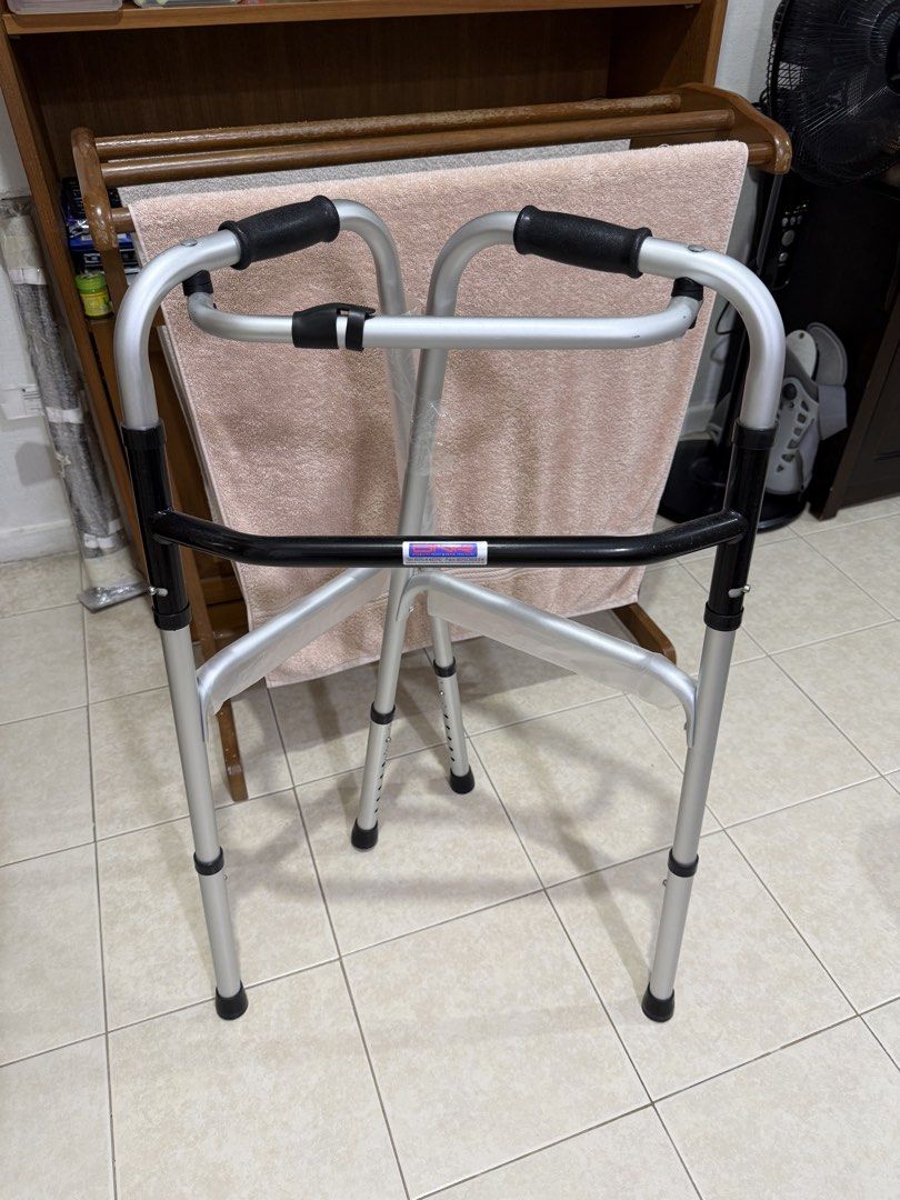 Walker (Category: Other Assistive Aids) located in Singapore. Submitted by nighthawk7278 (Listing ID 1453491861, Image 7). Description: - Lightweight and durable aluminum construction - Designed for enhanced stability and support - Features comfortable, non-slip grip handles - Folds for easy storage and transport - In excellent, brand new condition - Still in original plastic wrapping .
