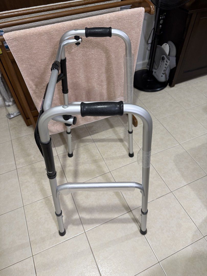 Walker (Category: Other Assistive Aids) located in Singapore. Submitted by nighthawk7278 (Listing ID 1453491861, Image 6). Description: - Lightweight and durable aluminum construction - Designed for enhanced stability and support - Features comfortable, non-slip grip handles - Folds for easy storage and transport - In excellent, brand new condition - Still in original plastic wrapping .