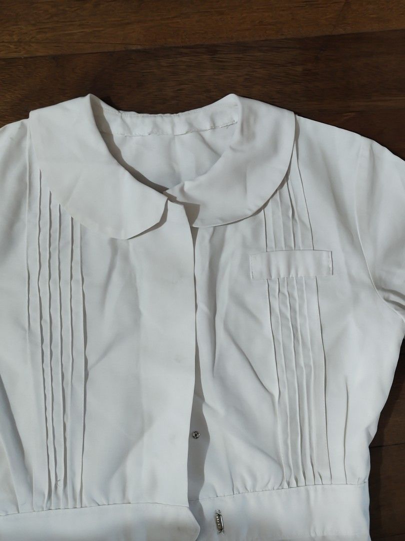white nurse's uniform dress (Category: Medical Supplies & Tools) located in Bulacan. Submitted by angel.decluttersx (Listing ID 1453462972, Image 3). Description: ww provided (for reference I'm small bodyframe) medium size up to 32" waistline Length 39 inches all buttons are working no issue.