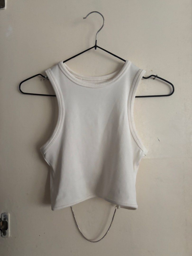 White Ribbed Tank Top with Chain Detail (Category: Sleeveless) located in Manila. Submitted by squid72 (Listing ID 1453609765, Image 2). Description: - White ribbed tank top - Sleeveless design - Cropped length - Features a unique back cut-out with a silver chain - Versatile for pairing with jeans or skirts Fits XS-S MOP: Gcash/bank transfer MOD: grab/lalamove (shouldered by customer) .